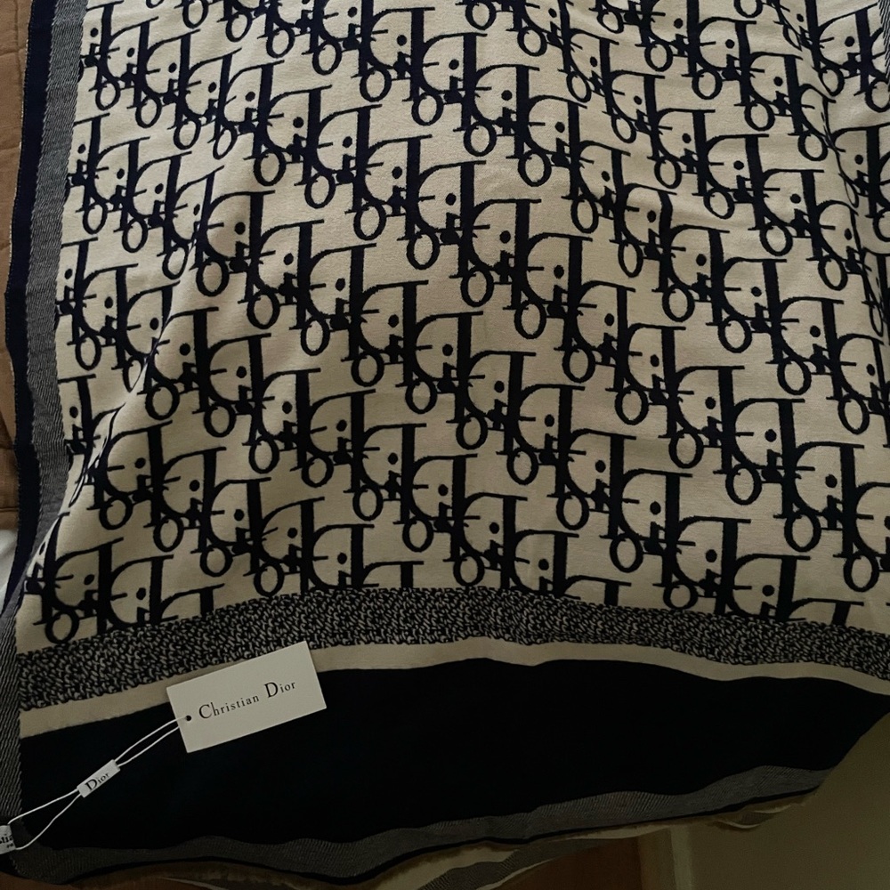 Navy blue D-Oblique shawl, soft and lightweight accessory.